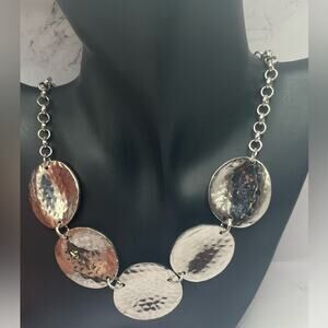 Silver tone hammered metal disc necklace